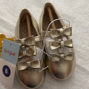 Cat & Jack Metallic Gold Girls' Dress Shoes with Triple Bows.